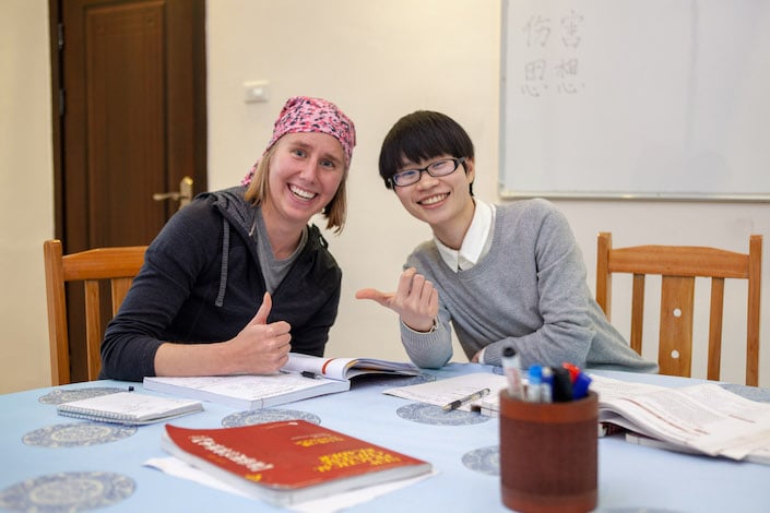 a CLI teacher and student during class