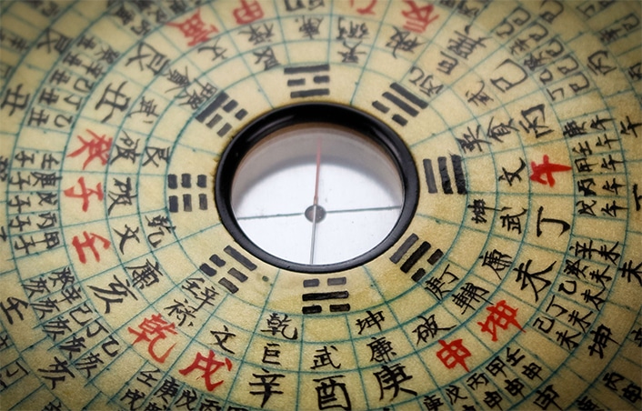 a close-up photo of a Chinese zodiac clock