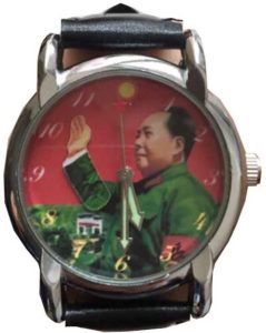 a wrist watch with an image of Chinese leader Mao with his hand raised