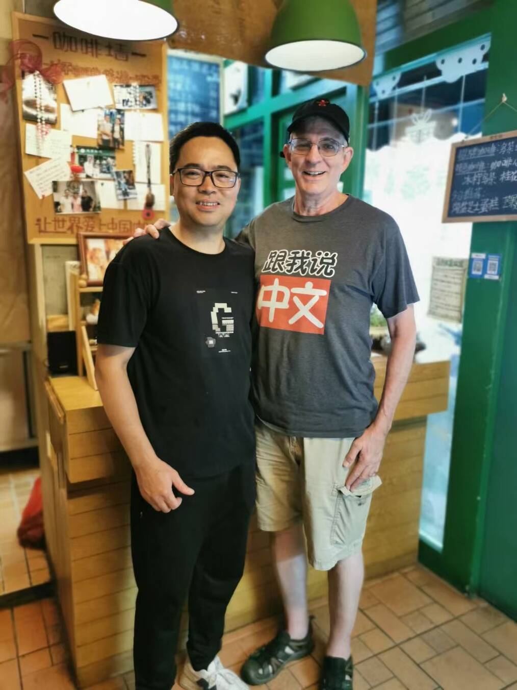 Adult student practicing Chinese with a teacher in a one-on-one lesson