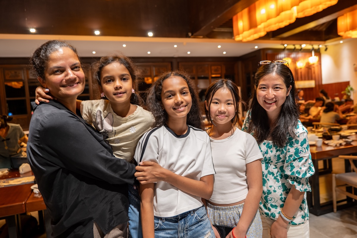 Students and teachers sharing dinner in Guilin