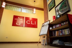 The CLI sign and a bookshelf in the Center lobby