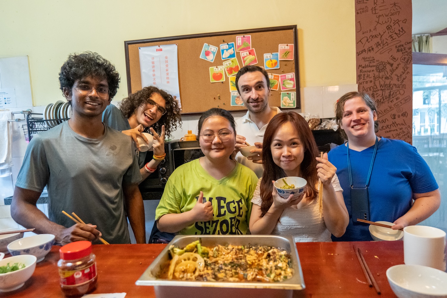 CLI students cooking together in the CLI kitchen