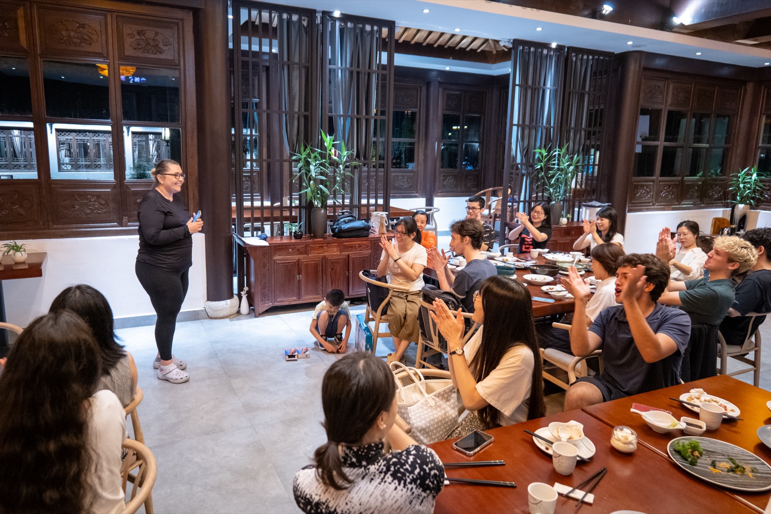 Audience applauding speaker