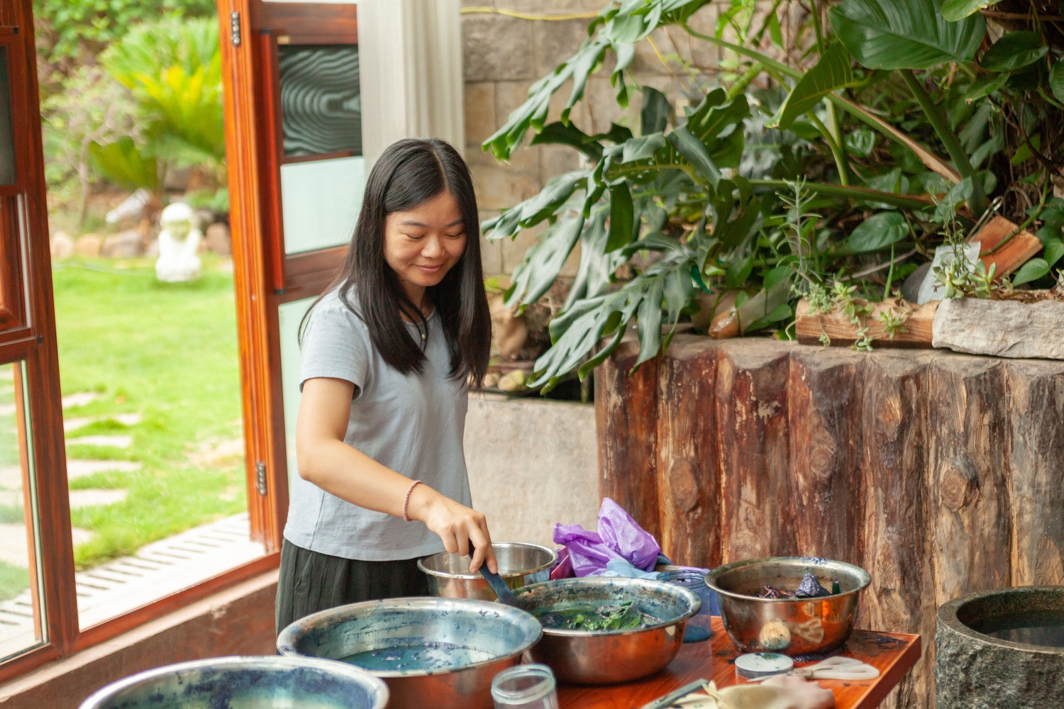 Student working at dye bowls