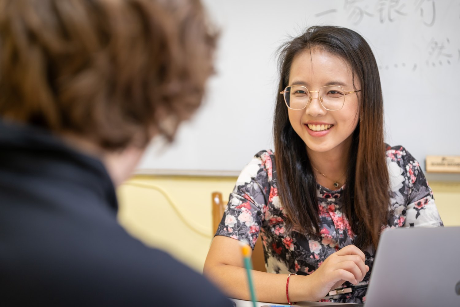 Teacher smiling in class