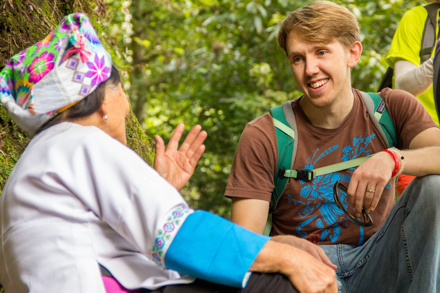 Traveler greeting a local elder near Guilin