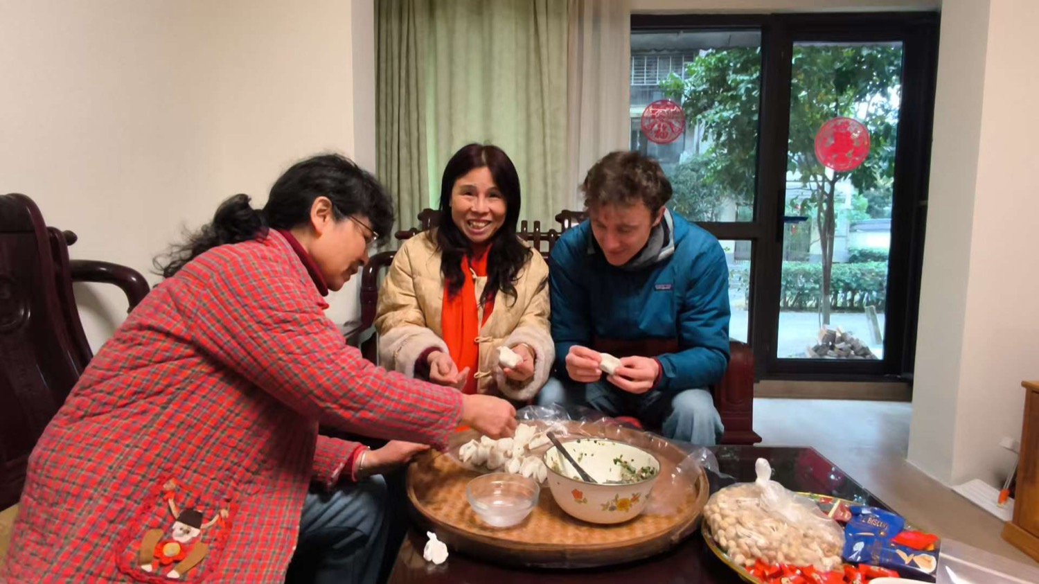 A CLI student with a homestay family in Guilin