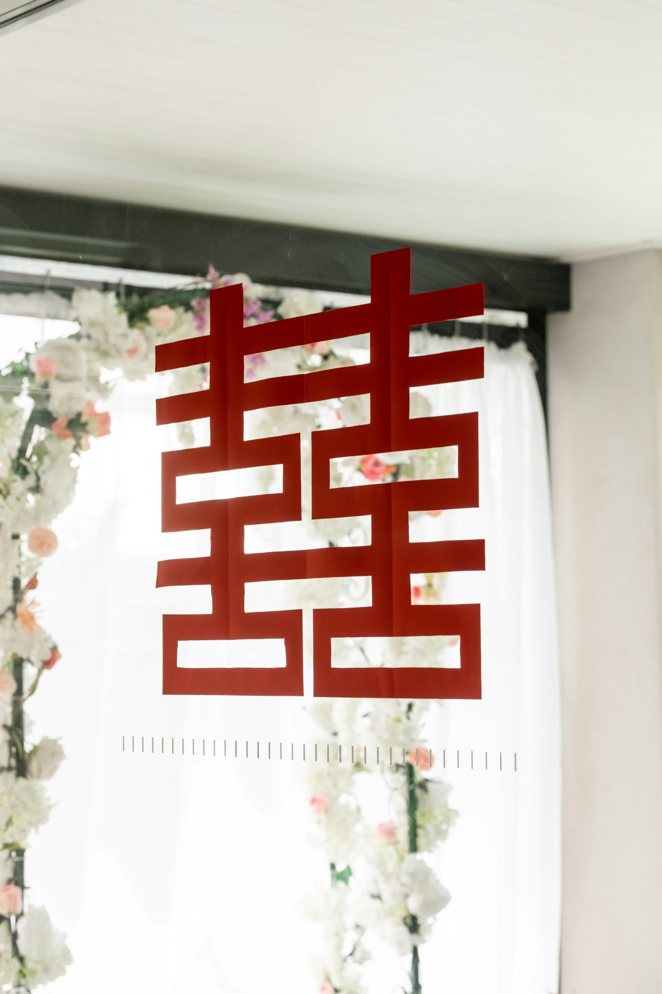 Traditional Chinese papercutting of the double happiness character used in wedding decorations
